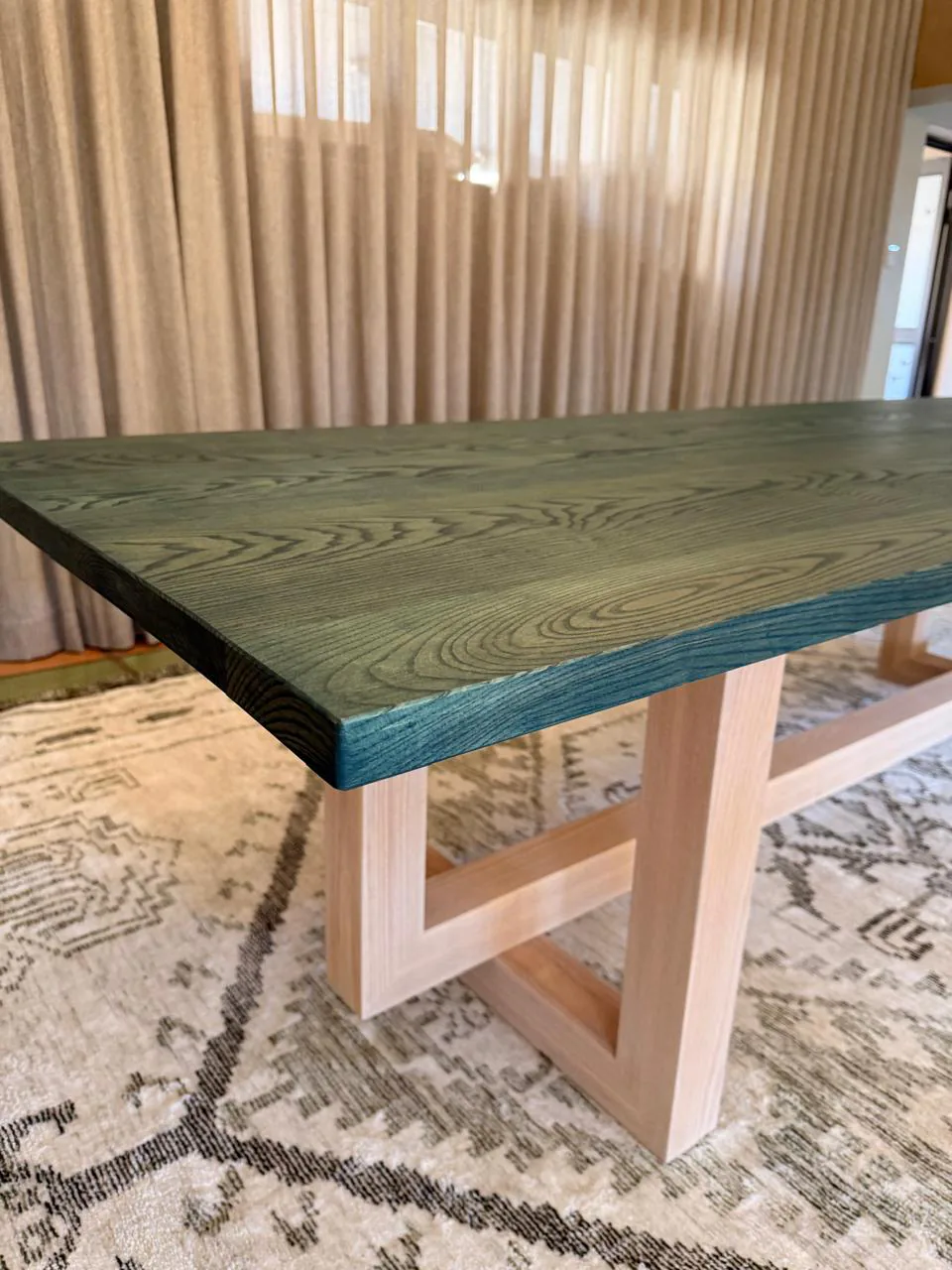 Custom pieces: Custom pieces sourced or coordinated around the scale, finish and practical needs of the room.