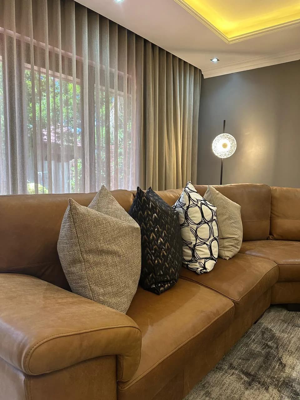Scatter cushions: Custom soft furnishing details used to pull fabric, colour and texture together in the room.