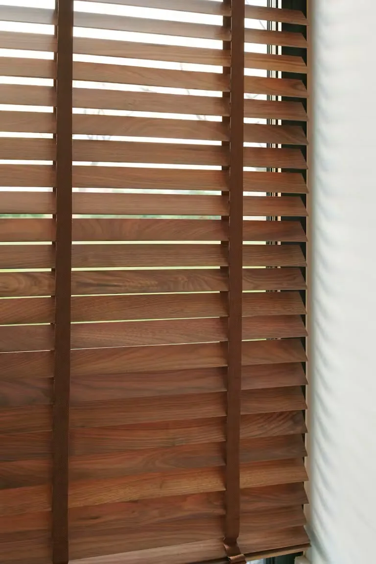 Wooden blinds: Wood-look or timber-style blinds for a warmer, more structured interior finish.