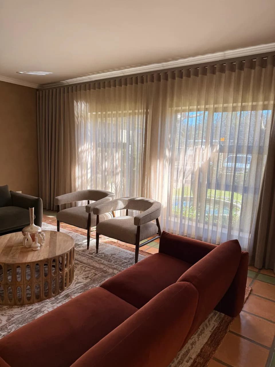 Curtains: Custom curtains made around the room, from fabric and lining choices to curtain tracks, rods, rails, measuring, installation and final dressing.